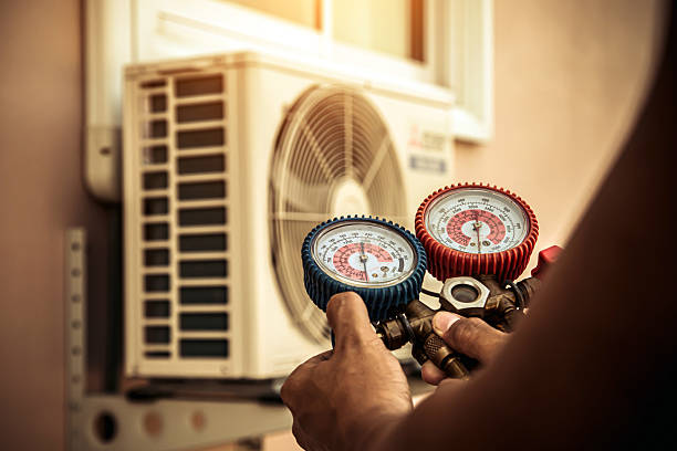 Professional Heat Pump Repair technician working in Drums, PA